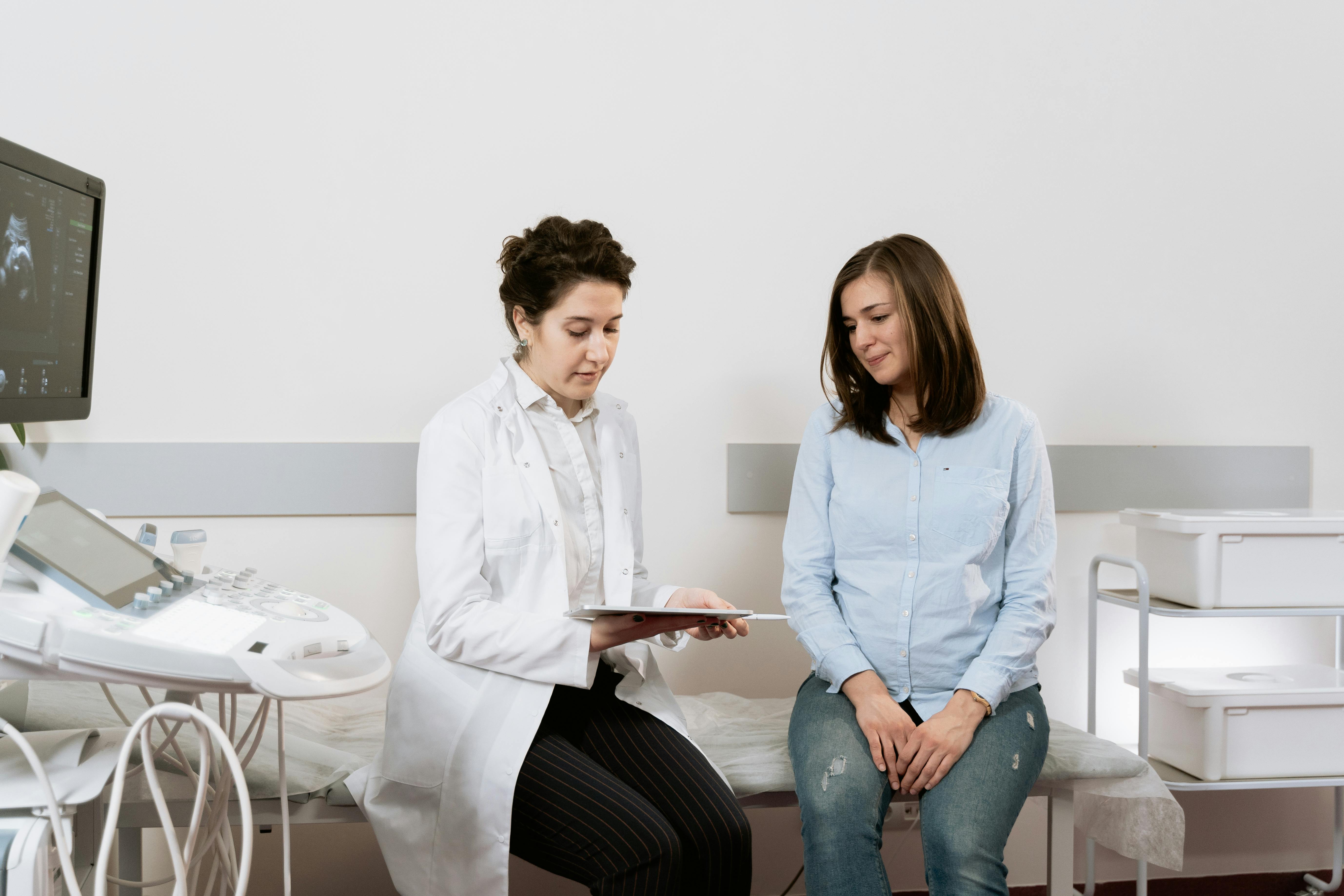 Senior woman with gynecologist in the office
